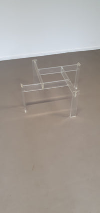 Vintage coffee table made by de Swart. Made of acrylic glass with a glass top