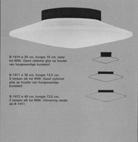 Pair of Raak Discus ceiling lamp (model B.1410) designed by Raak design team in the 60s.
